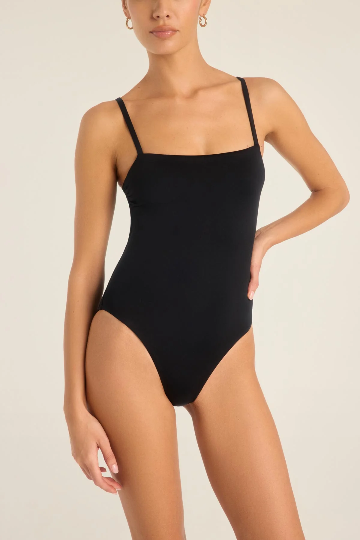 3455-jenna-high-leg-one-piece-full-cut-black-ecolux-1.webp Jenna High Leg One Piece Full Cut - Black EcoLux